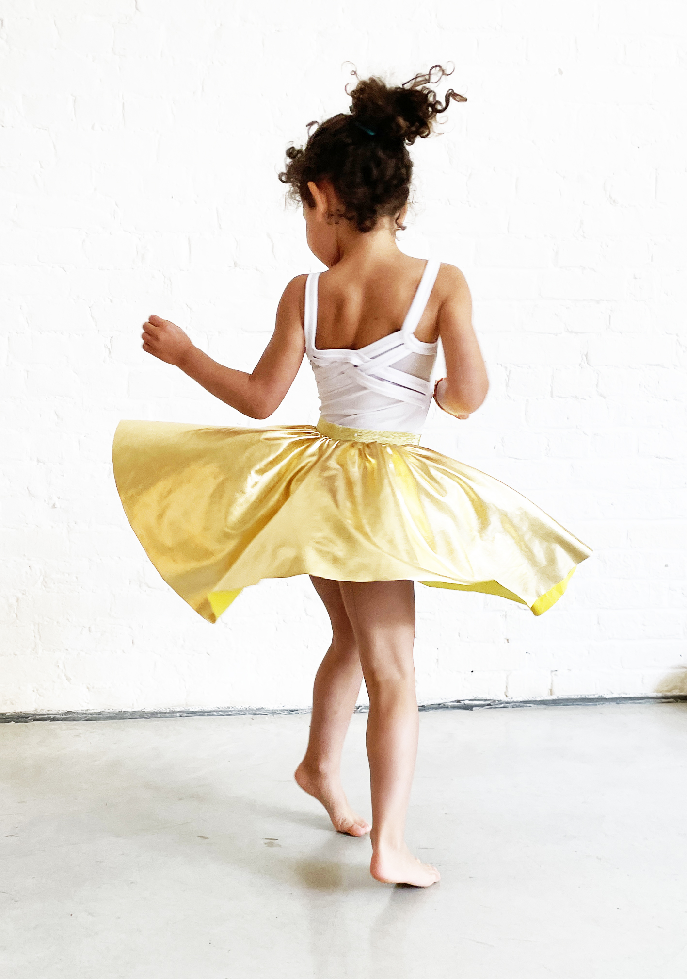 JUPE QUI TOURNE OR DEGUISEMENT ENFANT RATATAM